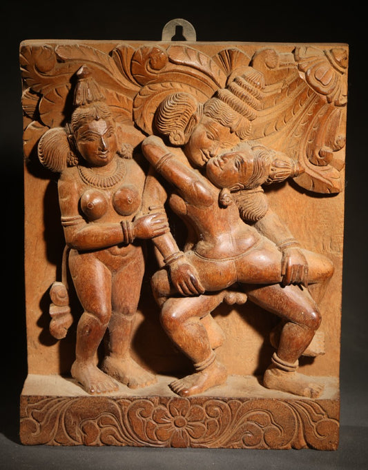 Vintage Indian Carved Wood Relief Panel Depicting Three Figures with Erotic Motif, Floral Border