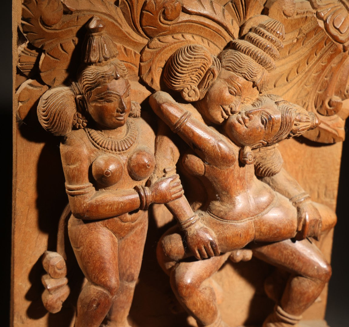 Vintage Indian Carved Wood Relief Panel Depicting Three Figures with Erotic Motif, Floral Border