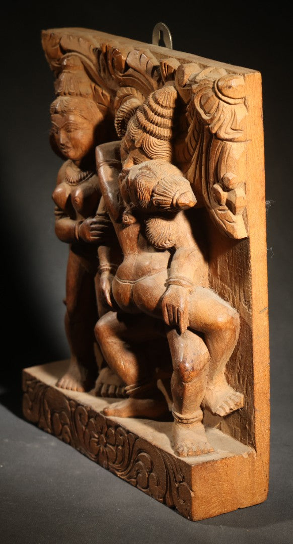 Vintage Indian Carved Wood Relief Panel Depicting Three Figures with Erotic Motif, Floral Border