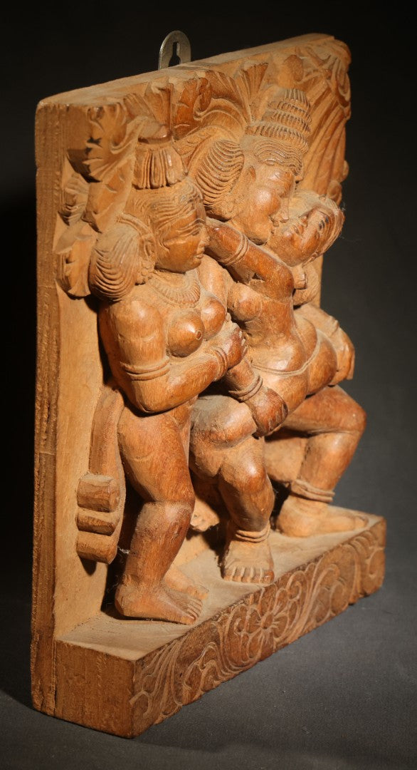 Vintage Indian Carved Wood Relief Panel Depicting Three Figures with Erotic Motif, Floral Border