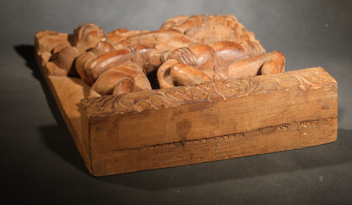 Vintage Indian Carved Wood Relief Panel Depicting Three Figures with Erotic Motif, Floral Border