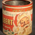 Lot 087 - Vintage Prince Albert "the National Joy Smoke" Christmas Tobacco Tin with Santa Claus, Snowy Village, Holly, and "Season's Greetings" Gift Tag, Paper Label Over Tin, no Lid, 5-3/8" H