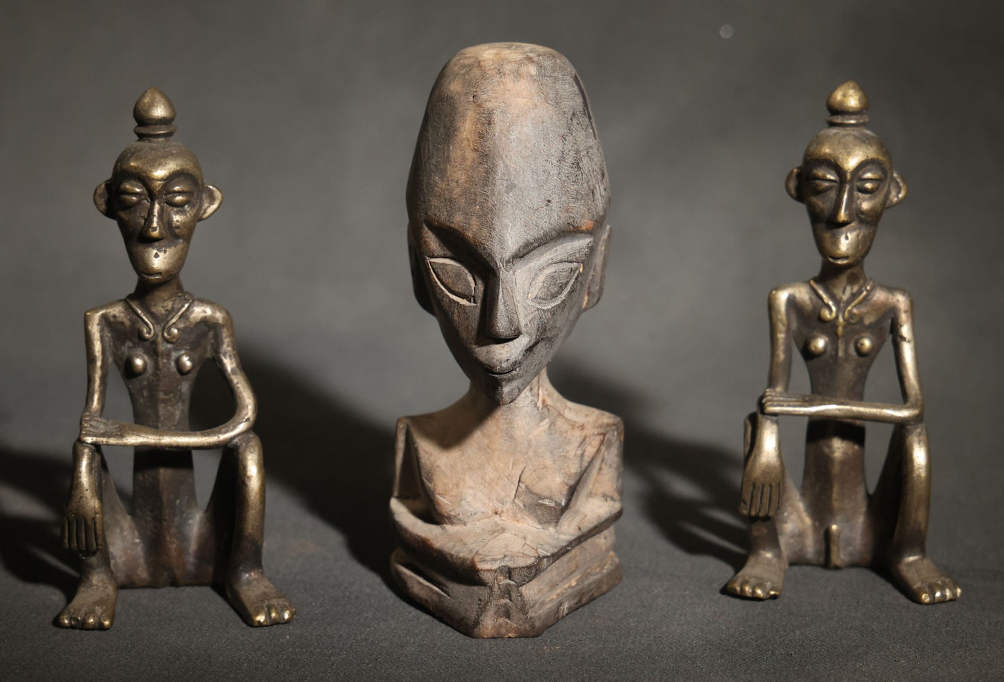 Trio of Vintage African-Style Metal and Wood Figures Including Two Seated Metal Figures and One Carved Wood Bust