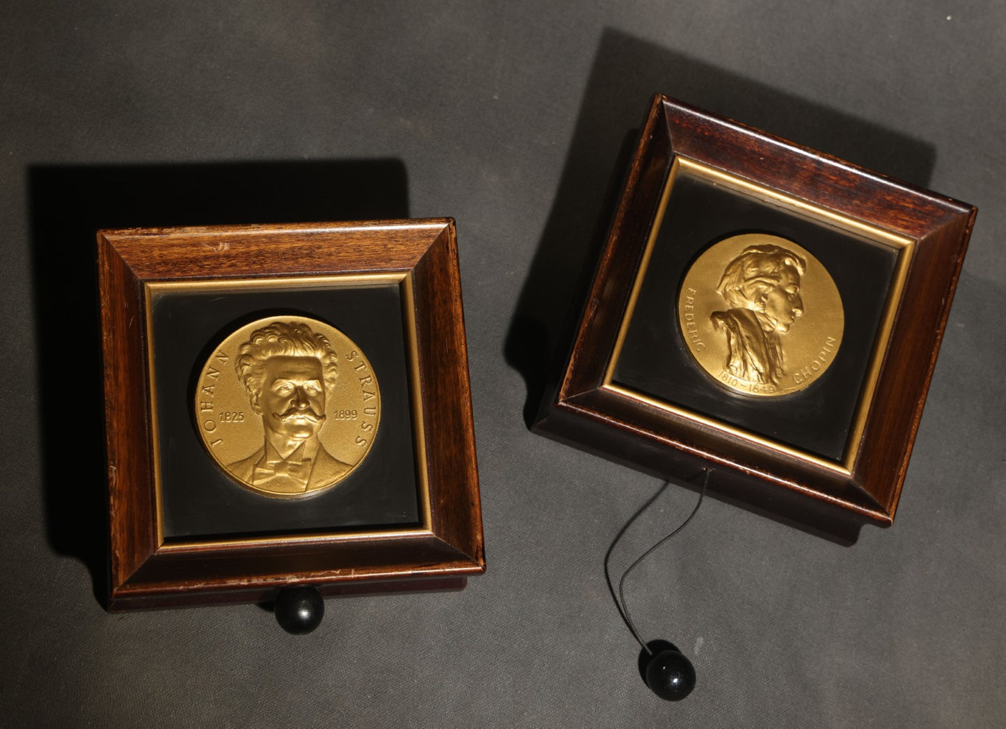 Pair of Vintage Music Masters Musical Wall Plaques with Thorens Movements, Johann Strauss "Emperor Waltz" and Frederic Chopin "Till the End of Time," Made in Switzerland, Inscribed and Dated 1949