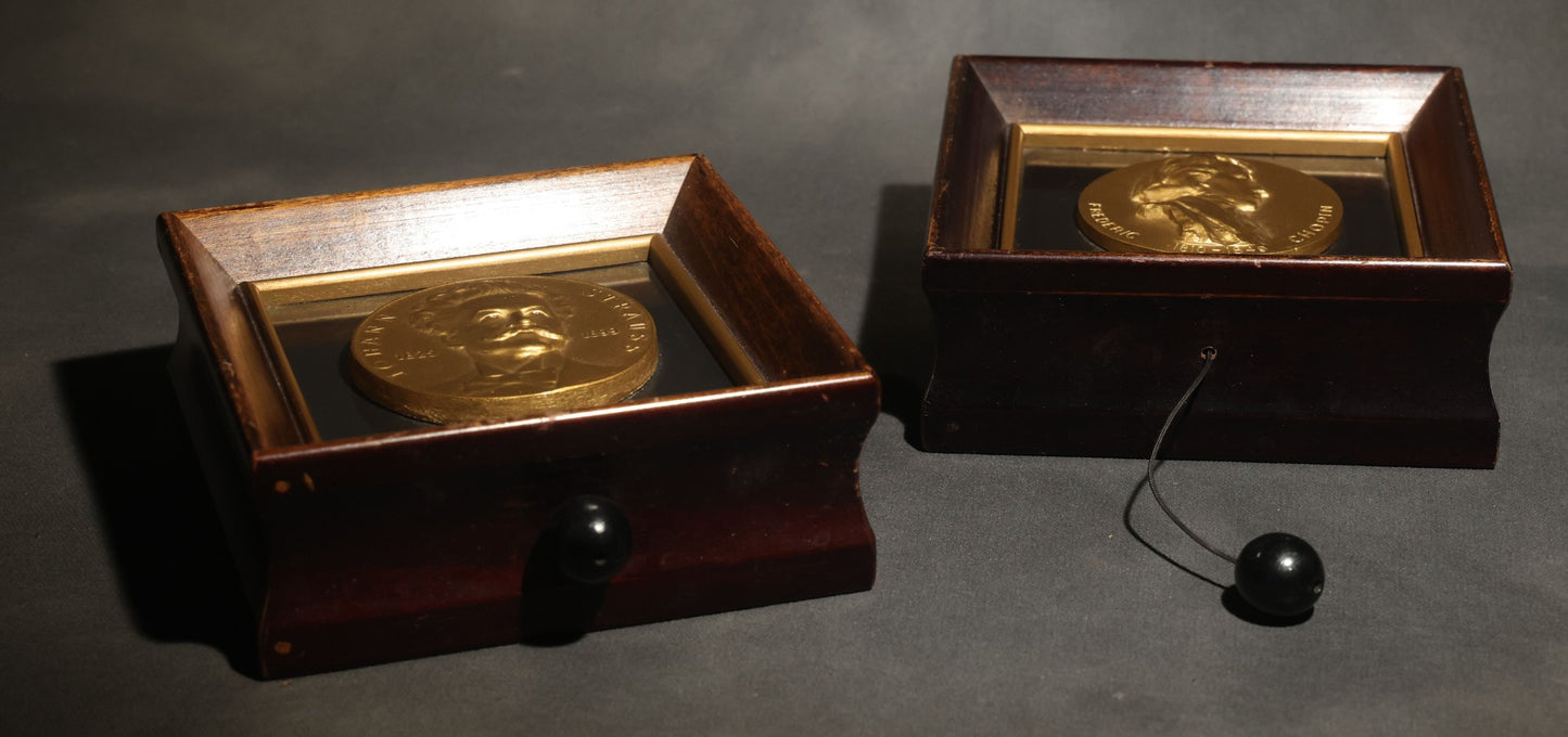 Pair of Vintage Music Masters Musical Wall Plaques with Thorens Movements, Johann Strauss "Emperor Waltz" and Frederic Chopin "Till the End of Time," Made in Switzerland, Inscribed and Dated 1949