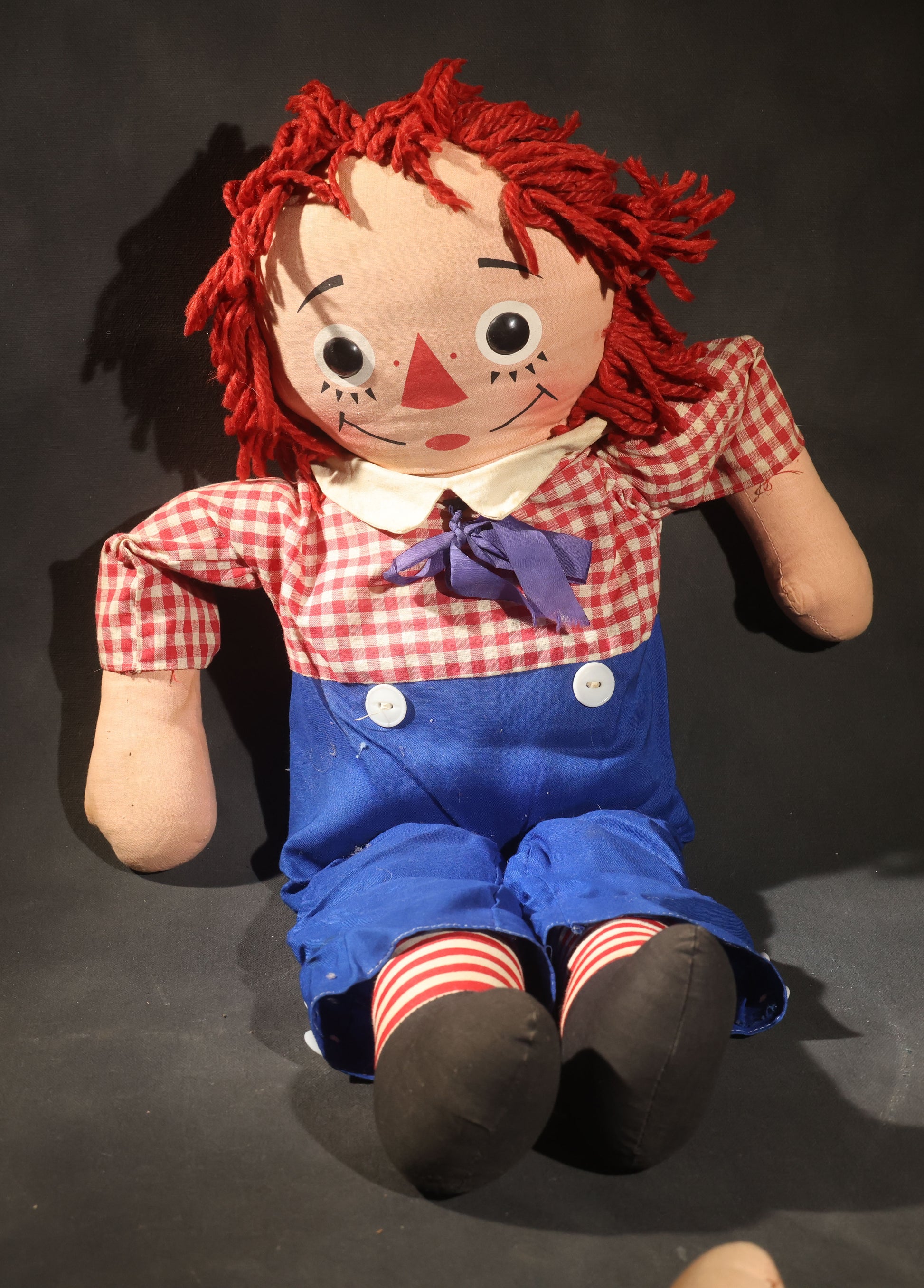 Grouping of Five Vintage Raggedy Ann and Andy Items Including Two Cloth Dolls, 24" L Each, and Three 1970s Plastic Wall Hangings by Dart Industries, Bobbs-Merrill Company Copyright