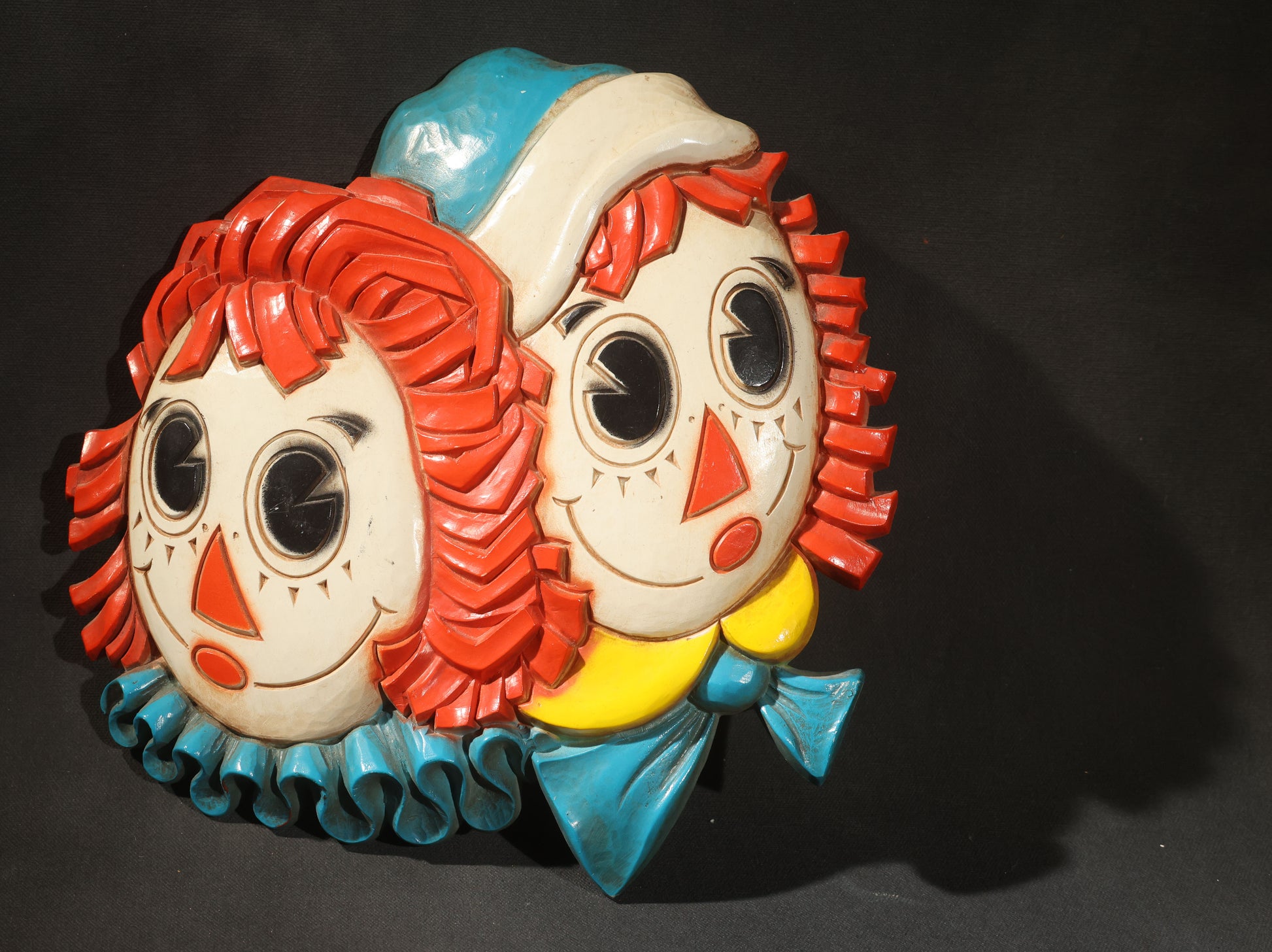 Grouping of Five Vintage Raggedy Ann and Andy Items Including Two Cloth Dolls, 24" L Each, and Three 1970s Plastic Wall Hangings by Dart Industries, Bobbs-Merrill Company Copyright