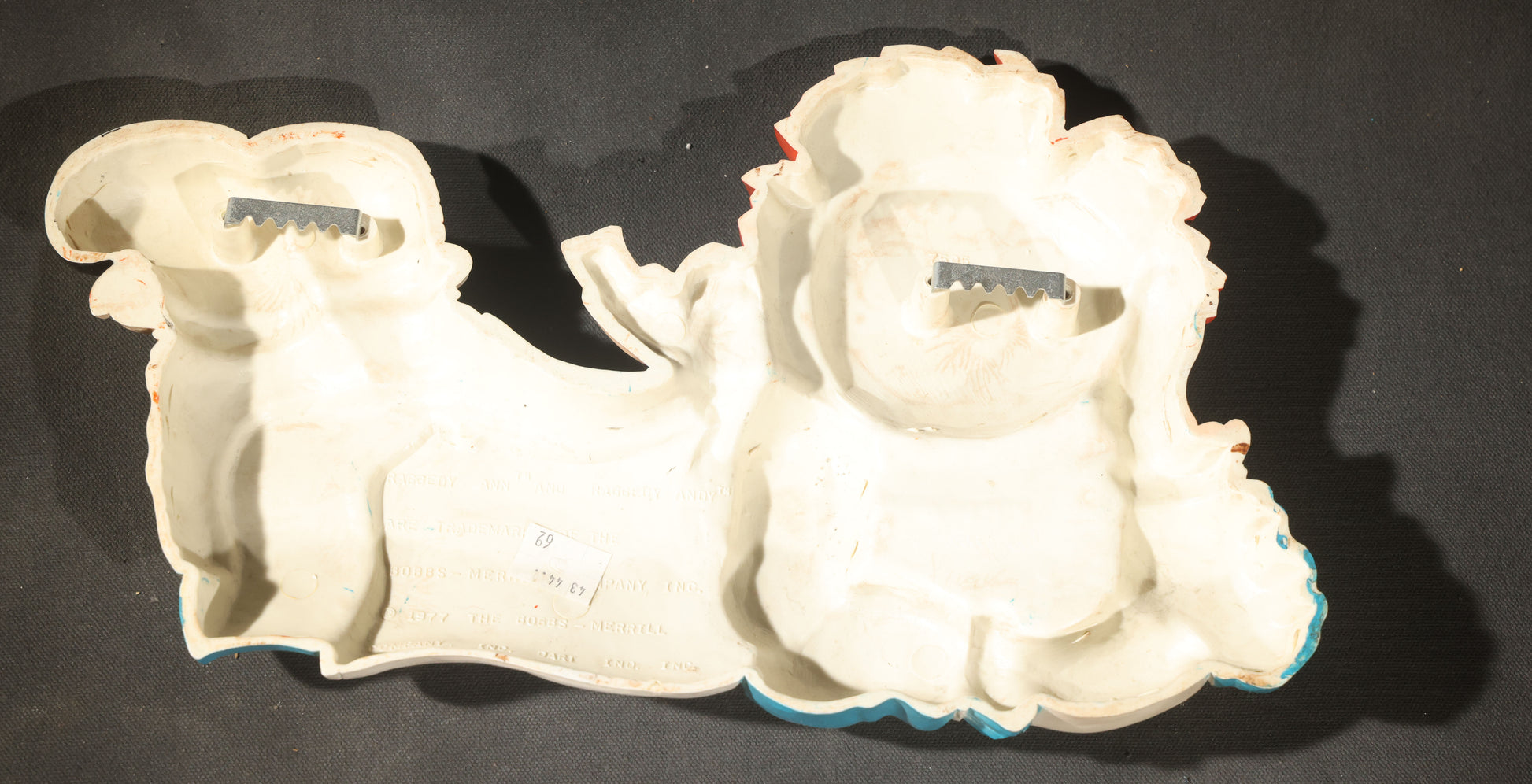 Grouping of Five Vintage Raggedy Ann and Andy Items Including Two Cloth Dolls, 24" L Each, and Three 1970s Plastic Wall Hangings by Dart Industries, Bobbs-Merrill Company Copyright