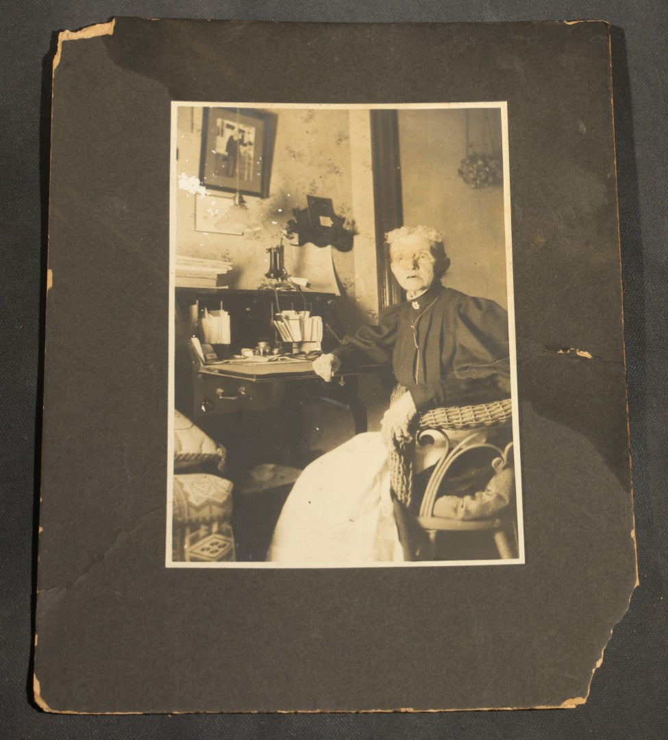 Grouping of Seven Antique Board-Mounted Photographs Including a Church, Street Scene, Couple's Portrait, Family Gathering, School Group, Early Automobile, and Parlor Interior with Telephone