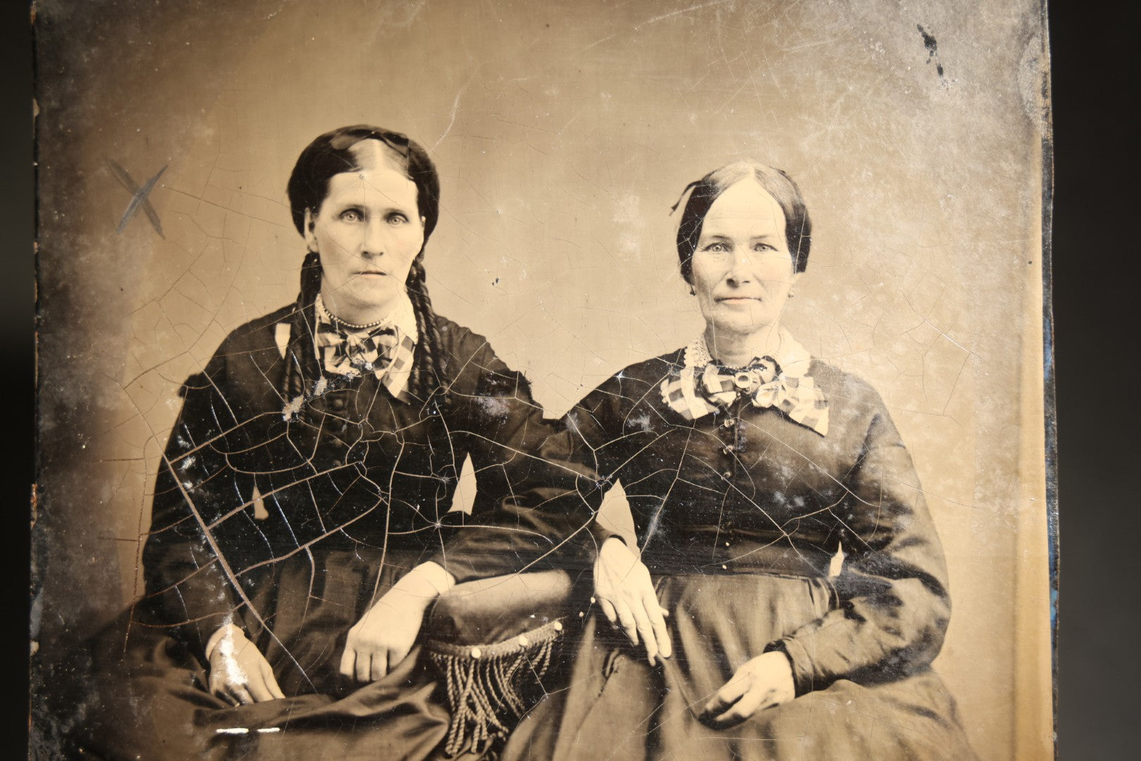 Antique Full Plate Tintype Photograph of Two Seated Women in Dark Dresses with Plaid Bows