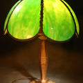 Lot 029 - Antique Green Slag Glass Table Lamp with Six-Panel Shade, Ornate Metal Base with Grape and Floral Motifs, Tested and Working