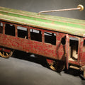 Lot 047 - Antique Pressed Steel Hill Climber Trolley Car, Likely by Schieble Toy & Novelty Co., Dayton, Ohio, Circa 1910, Red and Green with Trolley Pole and Cow Catcher, 16-1/2" L