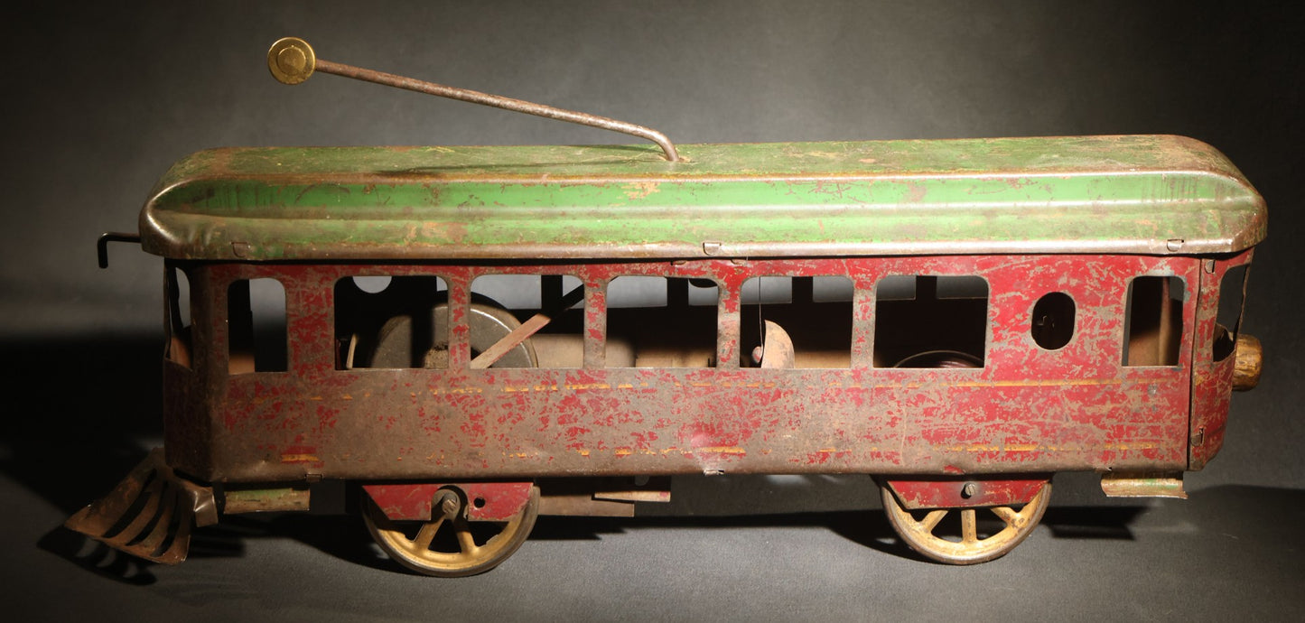 Antique Pressed Steel Hill Climber Trolley Car, Likely by Schieble Toy & Novelty Co., Dayton, Ohio, Circa 1910, Red and Green with Trolley Pole and Cow Catcher