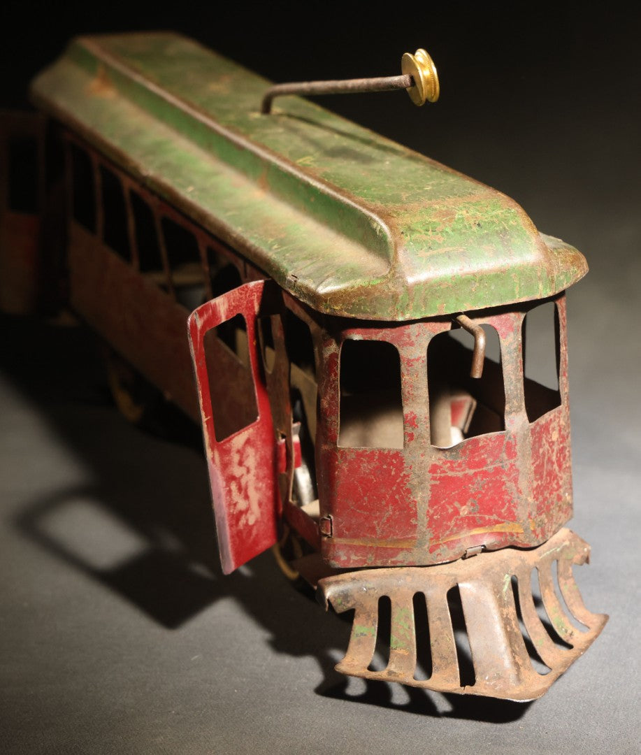 Antique Pressed Steel Hill Climber Trolley Car, Likely by Schieble Toy & Novelty Co., Dayton, Ohio, Circa 1910, Red and Green with Trolley Pole and Cow Catcher