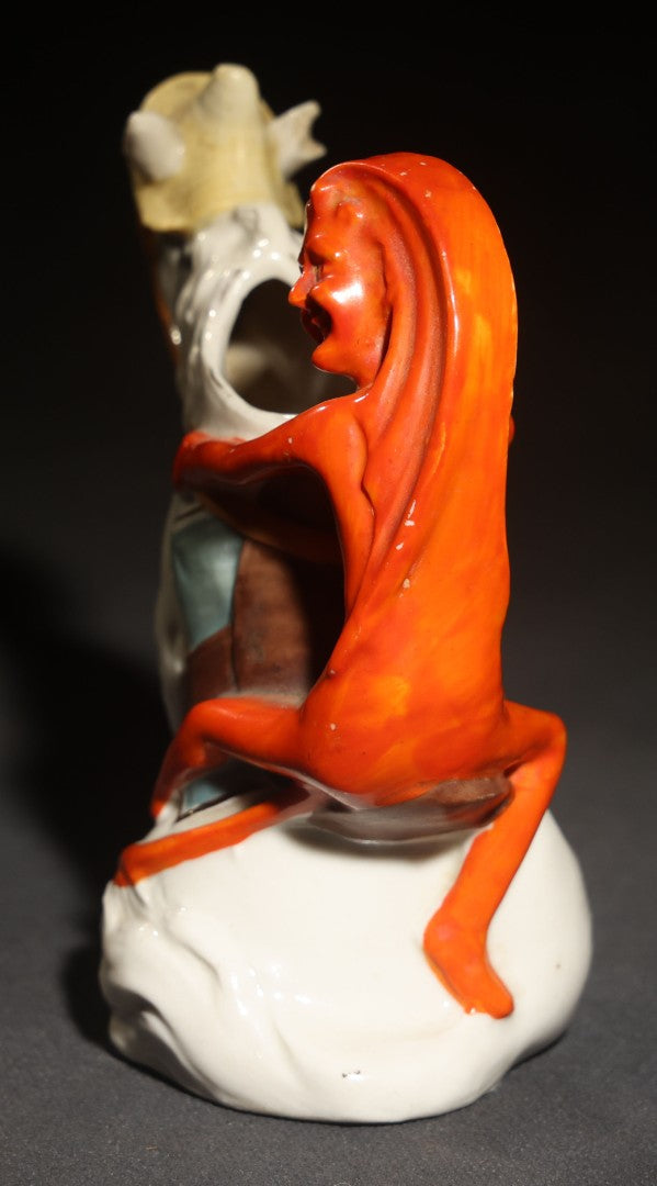 Antique Porcelain Figural Creamer of a Red Devil Riding a White Horse, Likely German, Note Horse Missing Tip of Ear