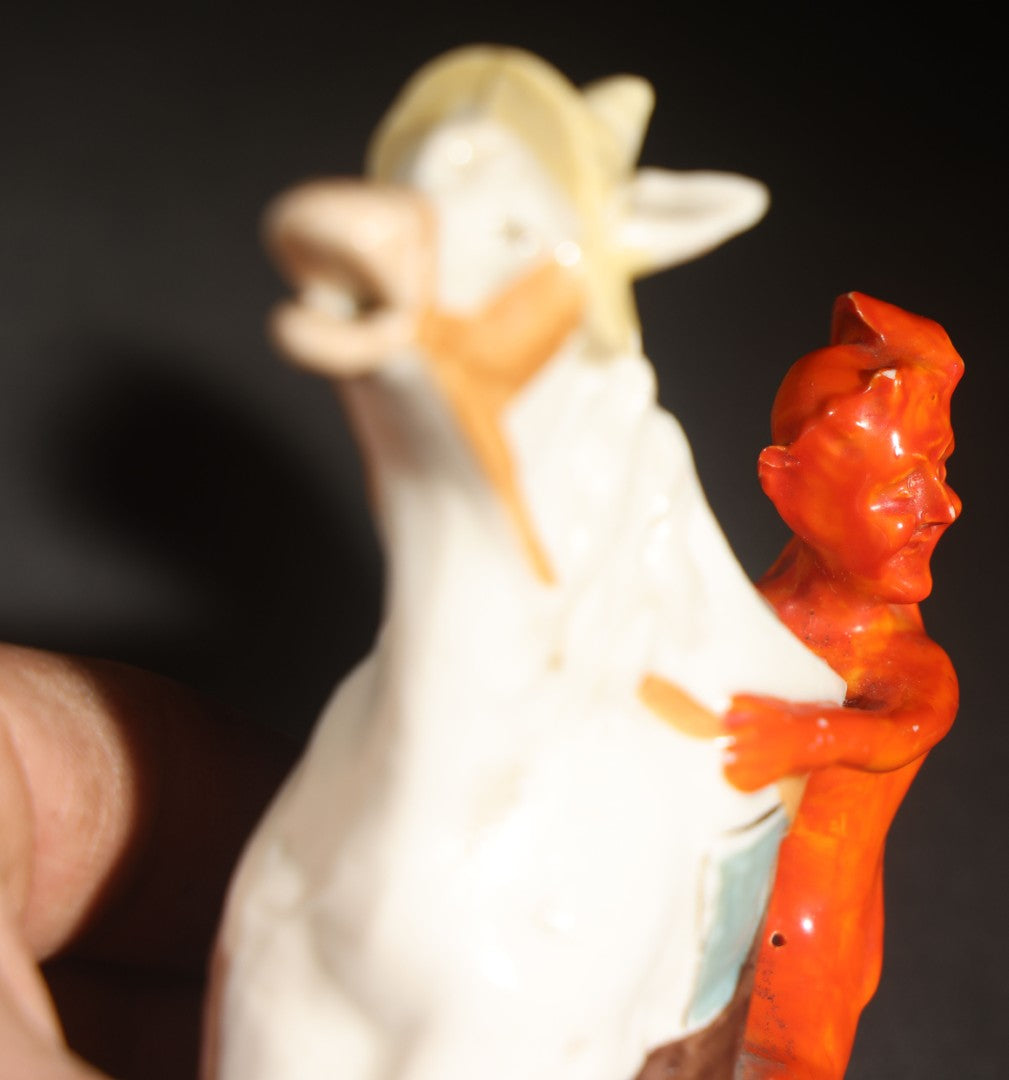 Antique Porcelain Figural Creamer of a Red Devil Riding a White Horse, Likely German, Note Horse Missing Tip of Ear