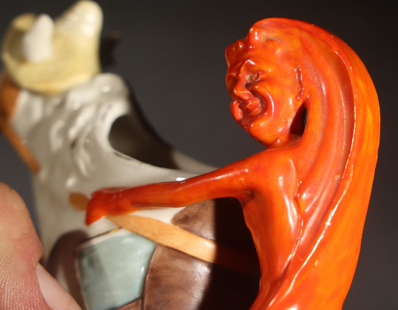 Antique Porcelain Figural Creamer of a Red Devil Riding a White Horse, Likely German, Note Horse Missing Tip of Ear