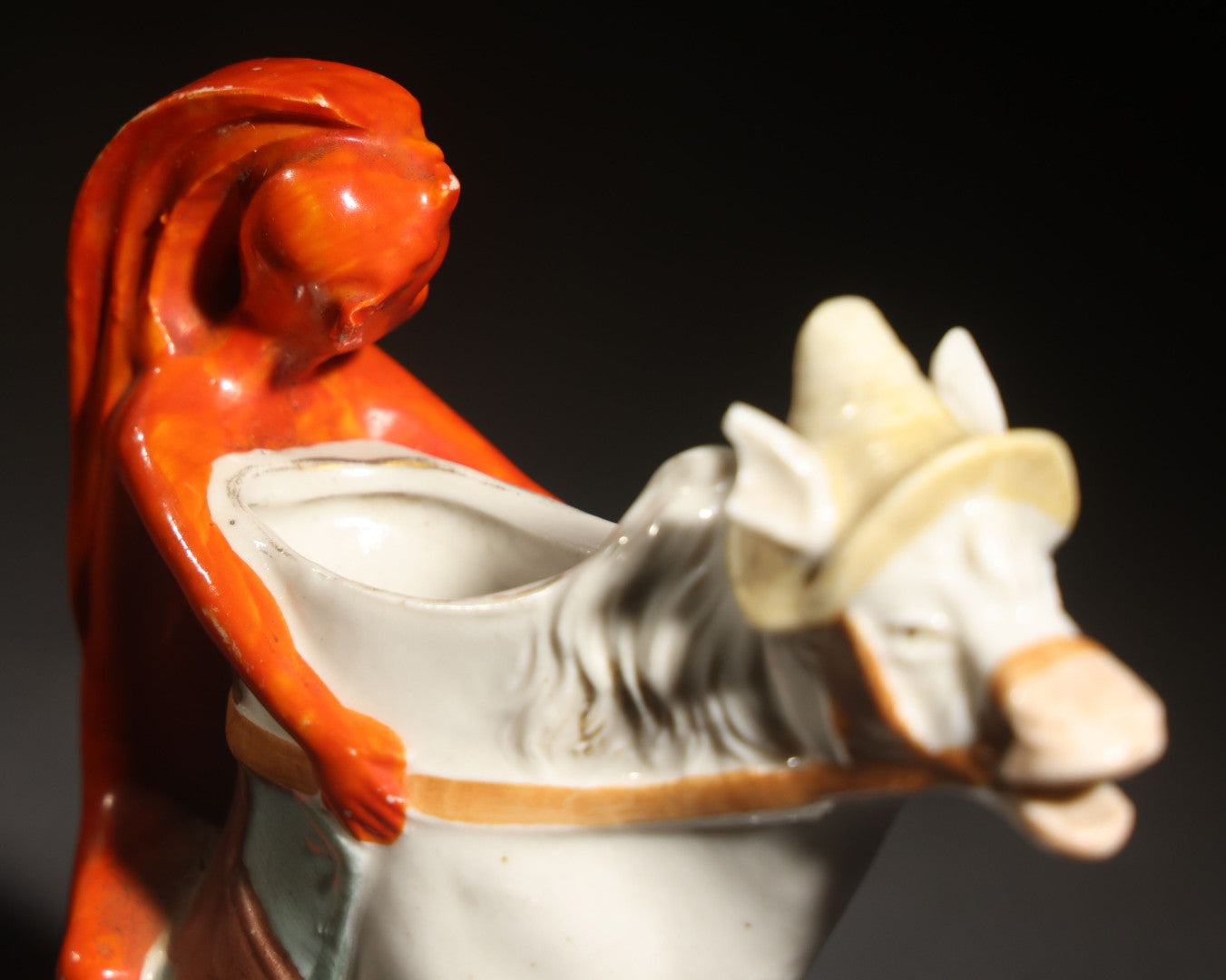 Antique Porcelain Figural Creamer of a Red Devil Riding a White Horse, Likely German, Note Horse Missing Tip of Ear