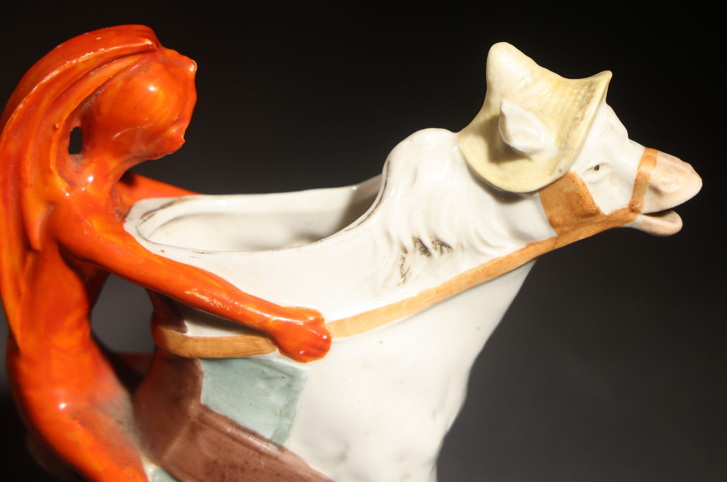 Antique Porcelain Figural Creamer of a Red Devil Riding a White Horse, Likely German, Note Horse Missing Tip of Ear