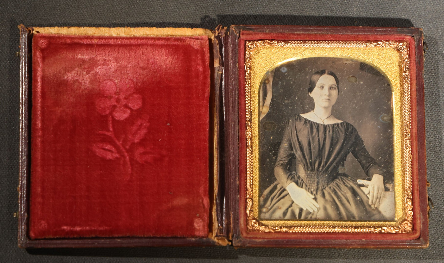 Antique 1/6th Plate Daguerreotype Photograph of a Young Woman in a Dark Dress Holding a Book, Full Intact Leatherette Case with Wear