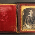 Lot 116 - Antique 1/6th Plate Daguerreotype Photograph of a Young Woman in a Dark Dress Holding a Book, Full Intact Leatherette Case with Wear