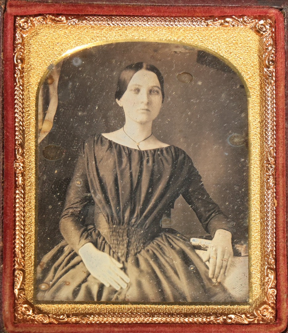 Antique 1/6th Plate Daguerreotype Photograph of a Young Woman in a Dark Dress Holding a Book, Full Intact Leatherette Case with Wear