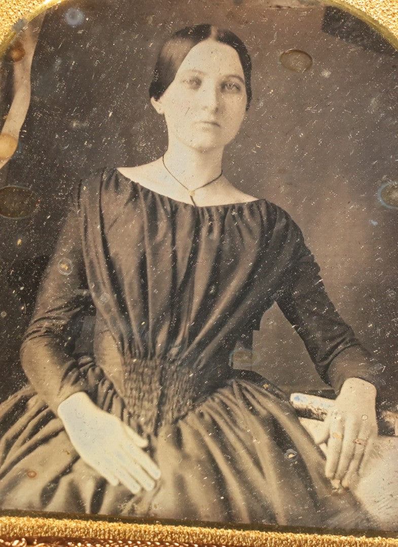 Antique 1/6th Plate Daguerreotype Photograph of a Young Woman in a Dark Dress Holding a Book, Full Intact Leatherette Case with Wear