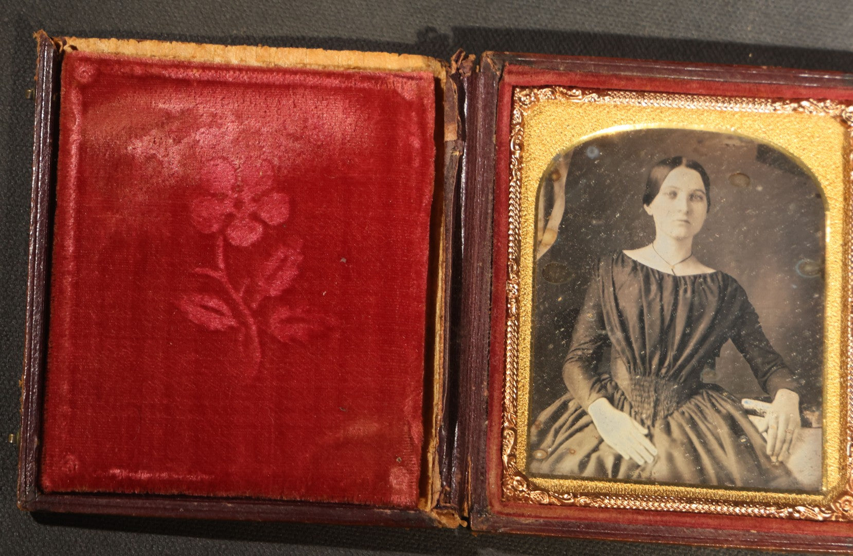 Antique 1/6th Plate Daguerreotype Photograph of a Young Woman in a Dark Dress Holding a Book, Full Intact Leatherette Case with Wear