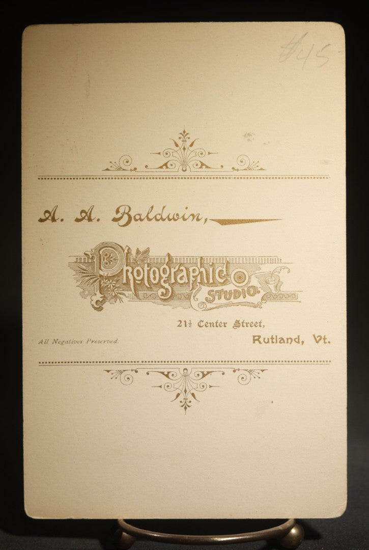 Antique Cabinet Card Photograph of a Man in a Laced White Shirt with a Large Bow, Possible Performer, Photographed by A.A. Baldwin, Rutland, Vermont