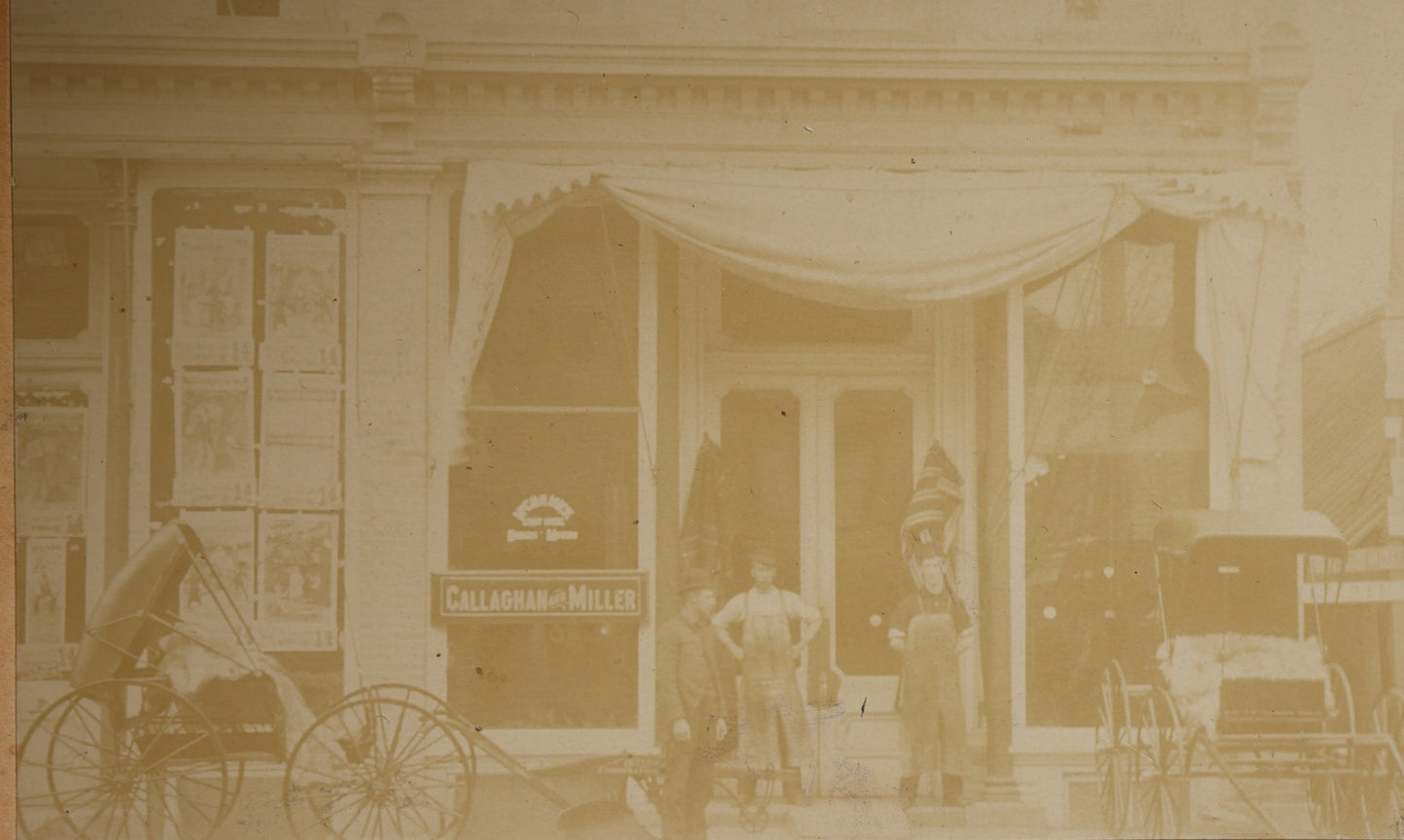 Antique Cabinet Card Occupational Photograph of the Callaghan and Miller Storefront with Horse-Drawn Buggies, Photographed by the Covell-Dash Photo Co., Chicago, Illinois and Buffalo, New York