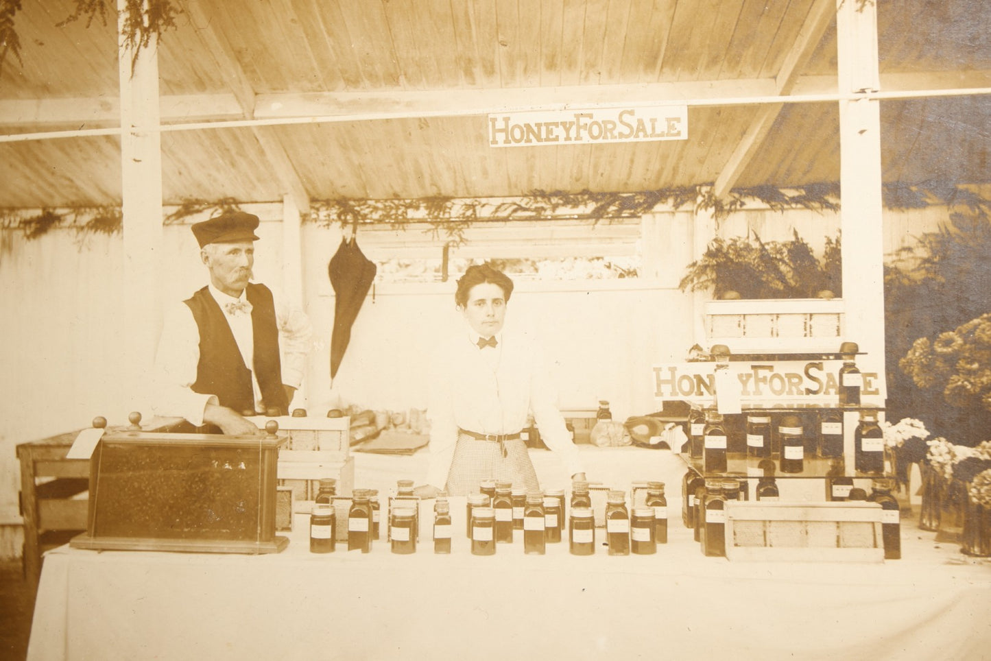 Antique Board-Mounted Occupational Photograph of W. Clinton Welch, Sr. and Annie Goodsell Selling Honey at the Danbury Fair, Coleytown, Westport, Connecticut, Circa 1900