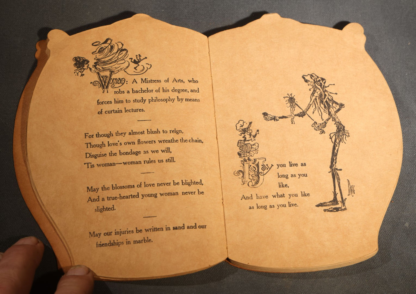 "Toasts" Antique Leather-Covered Stein-Shaped Novelty Book Compiled by W.M. Rhoads, Drawings by Clare Victor Dwiggins, Published by the Penn Publishing Company, Philadelphia, Pennsylvania, 1904