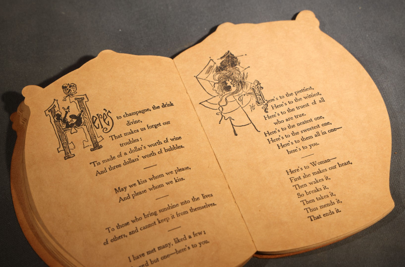 "Toasts" Antique Leather-Covered Stein-Shaped Novelty Book Compiled by W.M. Rhoads, Drawings by Clare Victor Dwiggins, Published by the Penn Publishing Company, Philadelphia, Pennsylvania, 1904