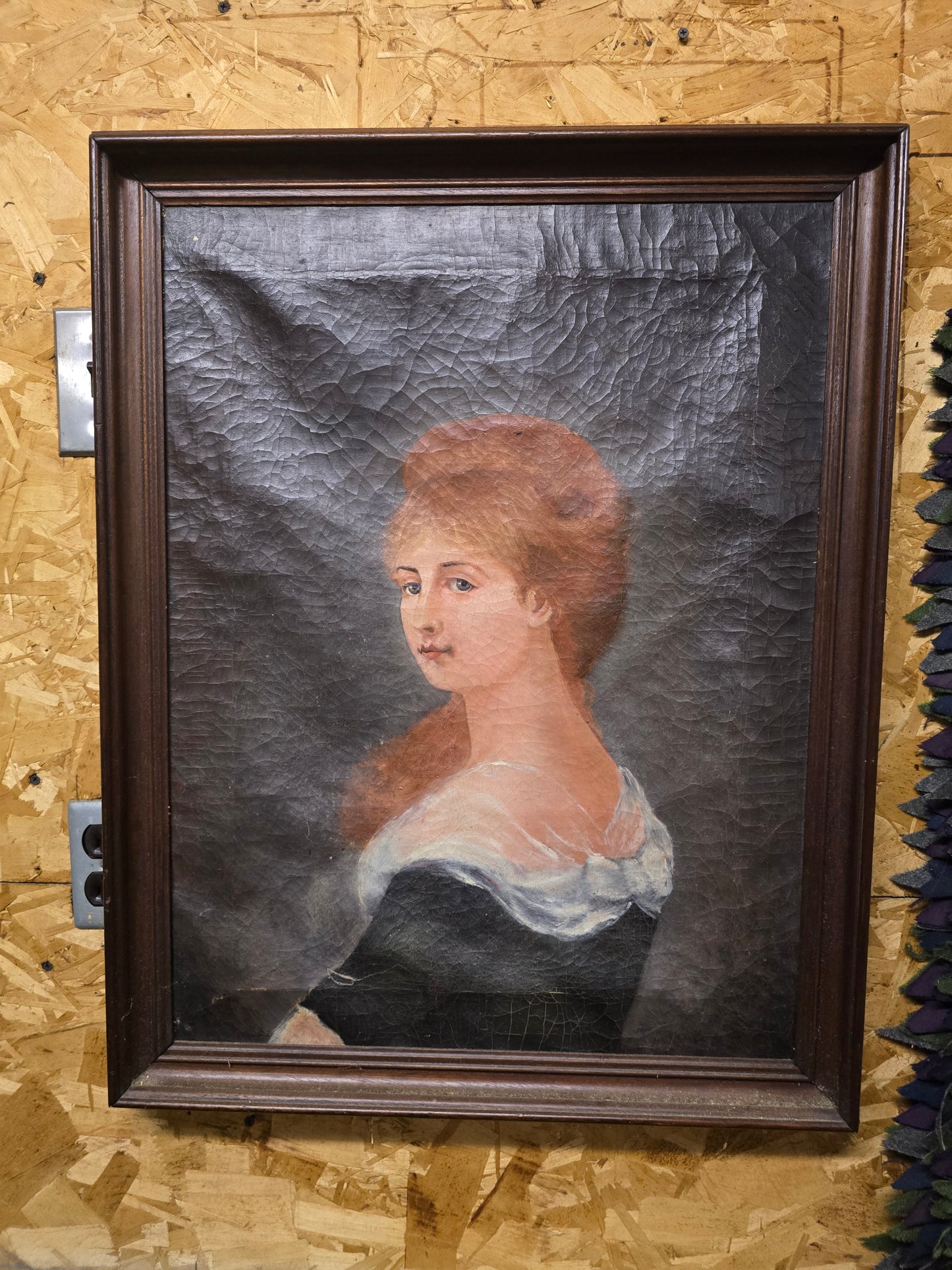 Painting of red headed woman in dark dress