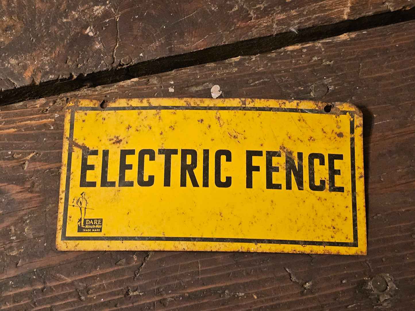 Vintage Electric Fence Tin Sign by Dare Minute Man