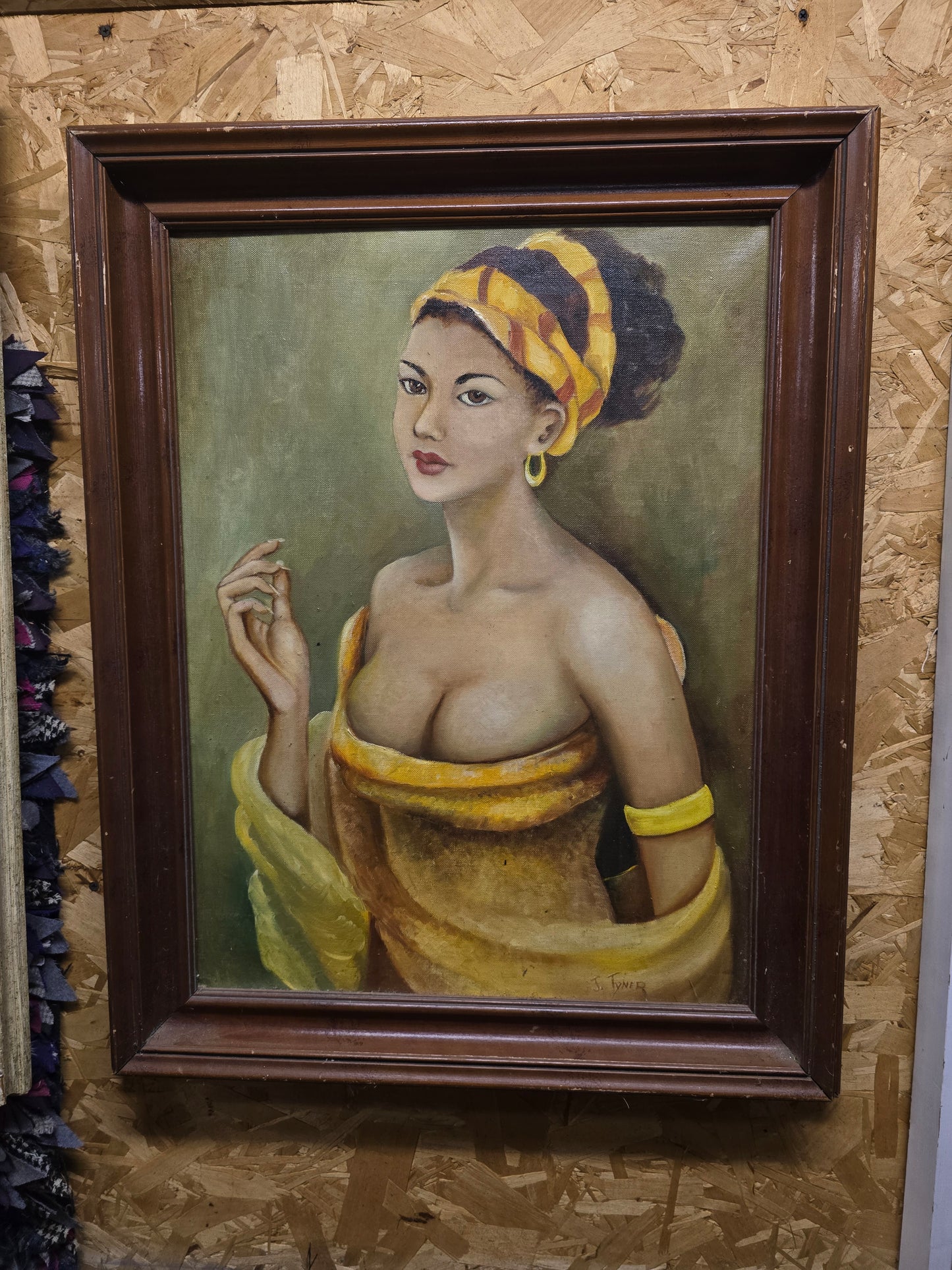 Painting of woman in yellow dress