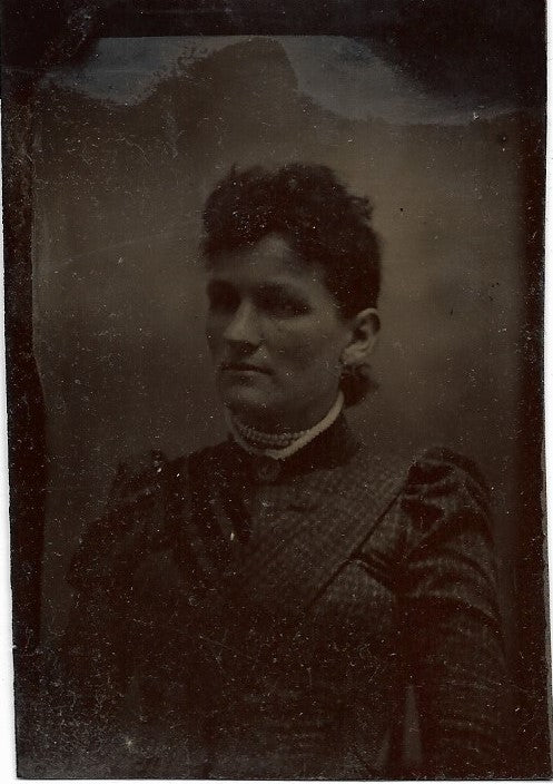 Tintype Photograph Portrait of a Woman with a Stoic Expression