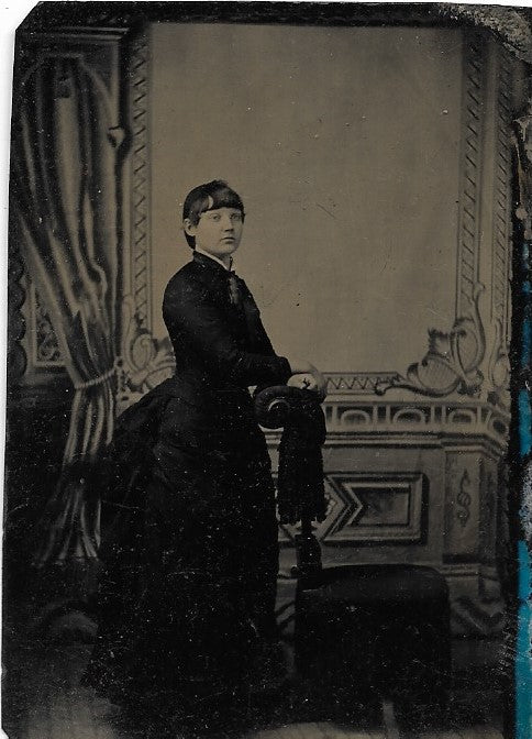Tintype Photograph of a Woman Resting Her Hands on a Chair