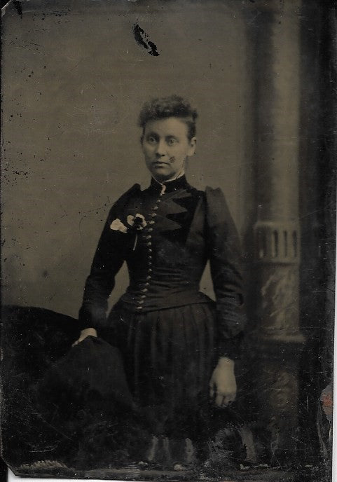 Tintype Photograph of a Woman in a Dress with a Boutineer