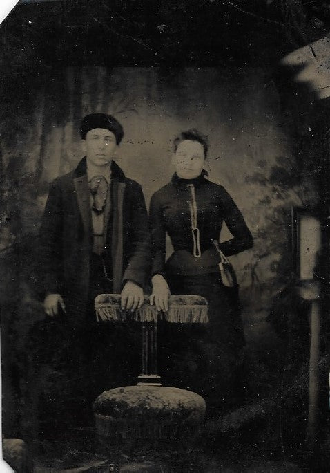 Tintype Photograph of a Couple with a Man in a Fur Hat