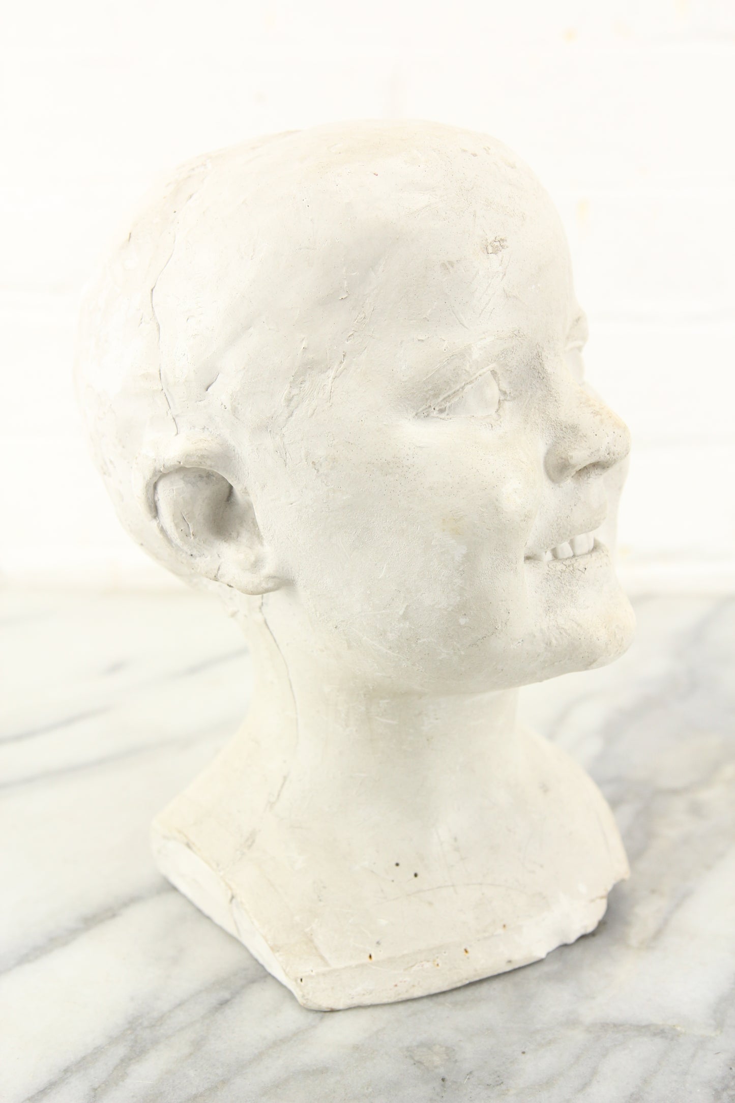 Antique Plaster Bust of a Slightly Creepy Child with a Toothy Smile