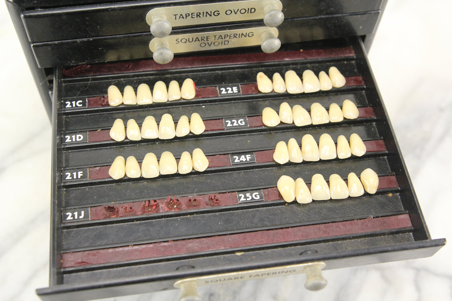 The Dentists' Supply Co. of New York Bioform False Teeth Bakelite Cabinet