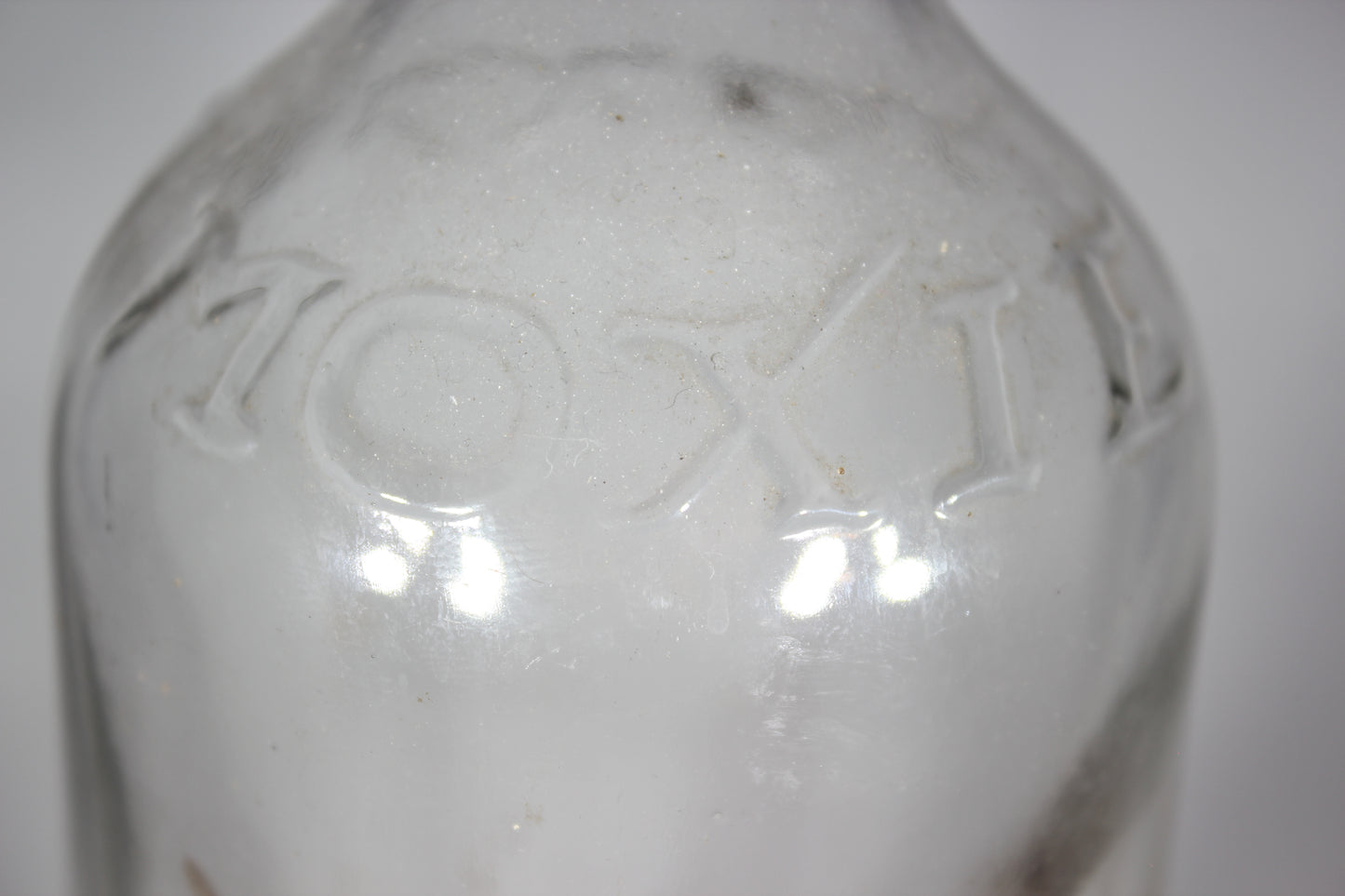 Vintage Moxie Glass Soda Bottle with Partial Label