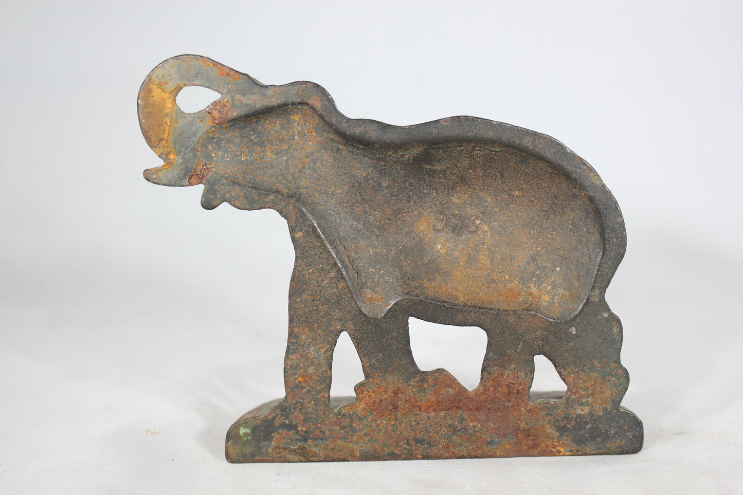 Cast Iron Elephant Bookend or Doorstop with Green Paint