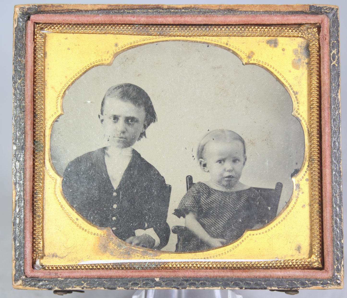Ambrotype Photograph of Siblings with Concerned Expressions in Case
