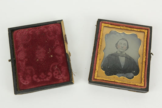 Ambrotype Photograph of a Young Man with an Enormous Bow Tie in Case