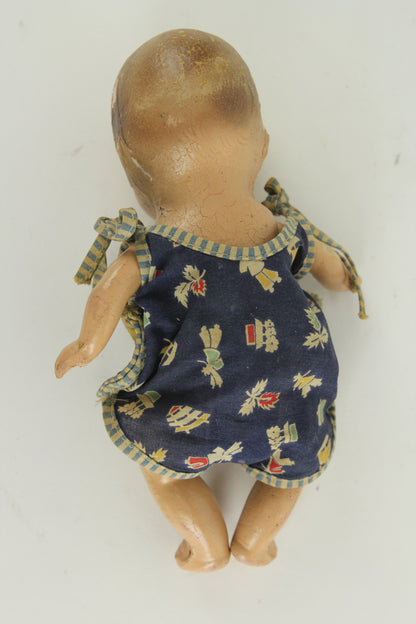 Small Size Composition Baby Doll with Blue Eyes and a Blue Onesie, 9"