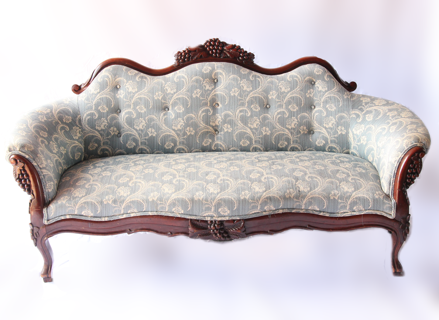 Ornate Blue Upholstered Victorian Camelback Sofa with Grape Carving Motif