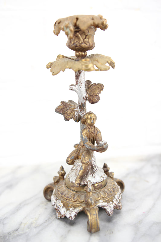 Ornate Brass Candlestick with Figural Man Holding a Bird's Nest