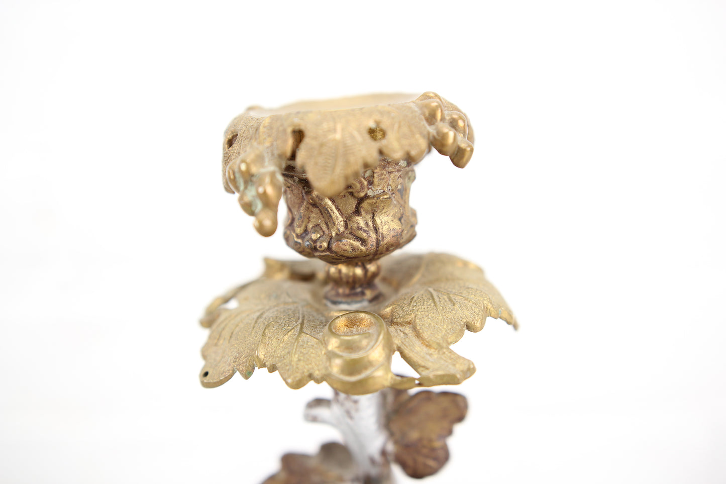 Ornate Brass Candlestick with Figural Man Holding a Bird's Nest